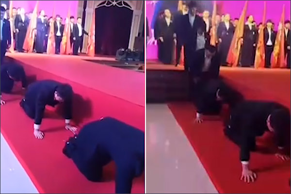 Chinese workers crawl on their hands and knees after missing targets Chinese workers crawl on their hands and knees after missing targets