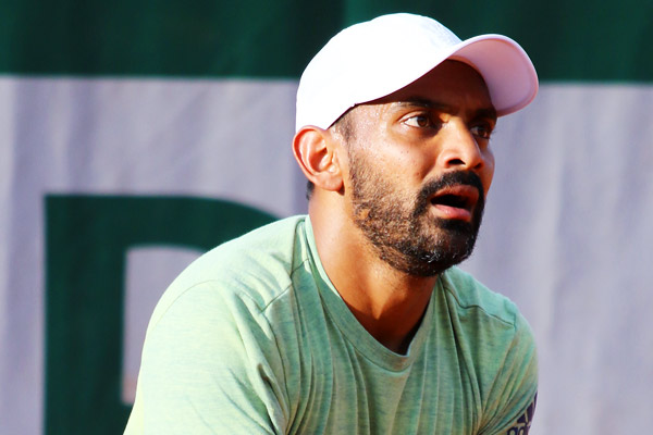 Divij Sharan advances to 2nd round and Bopanna loses Divij Sharan advances to 2nd round and Bopanna loses
