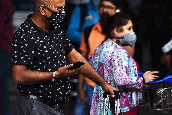 Scientists say Coronavirus can spread through just breathing and talking Scientists say Coronavirus can spread through just breathing and talking