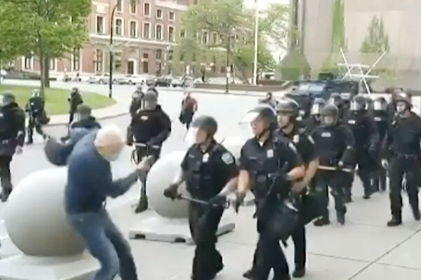 US police officers suspended who were seen shoving a 75-year-old man to the ground in a video clip US police officers suspended who were seen shoving a 75-year-old man to the ground in a video clip