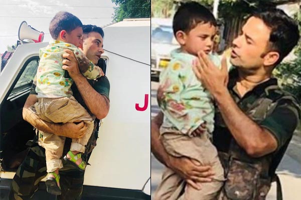 J&K Police save 3-year-old kid from getting hit by bullets during Sopore encounter J&K Police save 3-year-old kid from getting hit by bullets during Sopore encounter