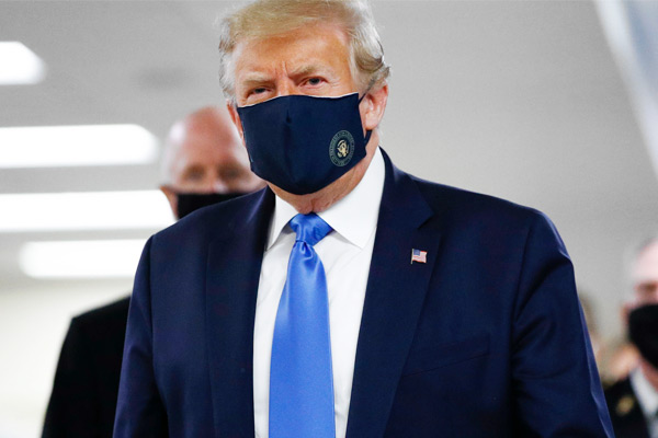 In a first US President Donald Trump wears mask during visit to wounded service members In a first US President Donald Trump wears mask during visit to wounded service members
