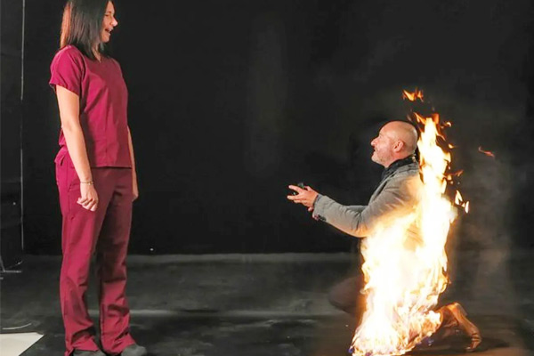 Stuntman proposes girlfriend for marriage while on fire and her answer was yes Stuntman proposes girlfriend for marriage while on fire and her answer was yes
